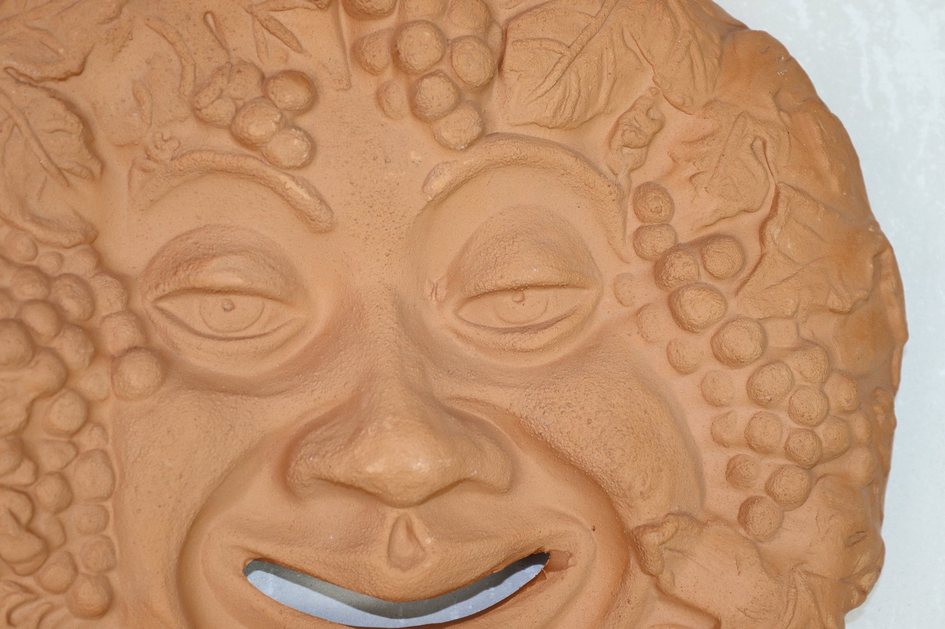 Bacco maschera in terracotta da appendere