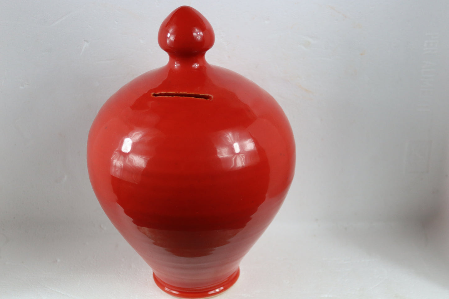 salvadanaio in ceramica rosso